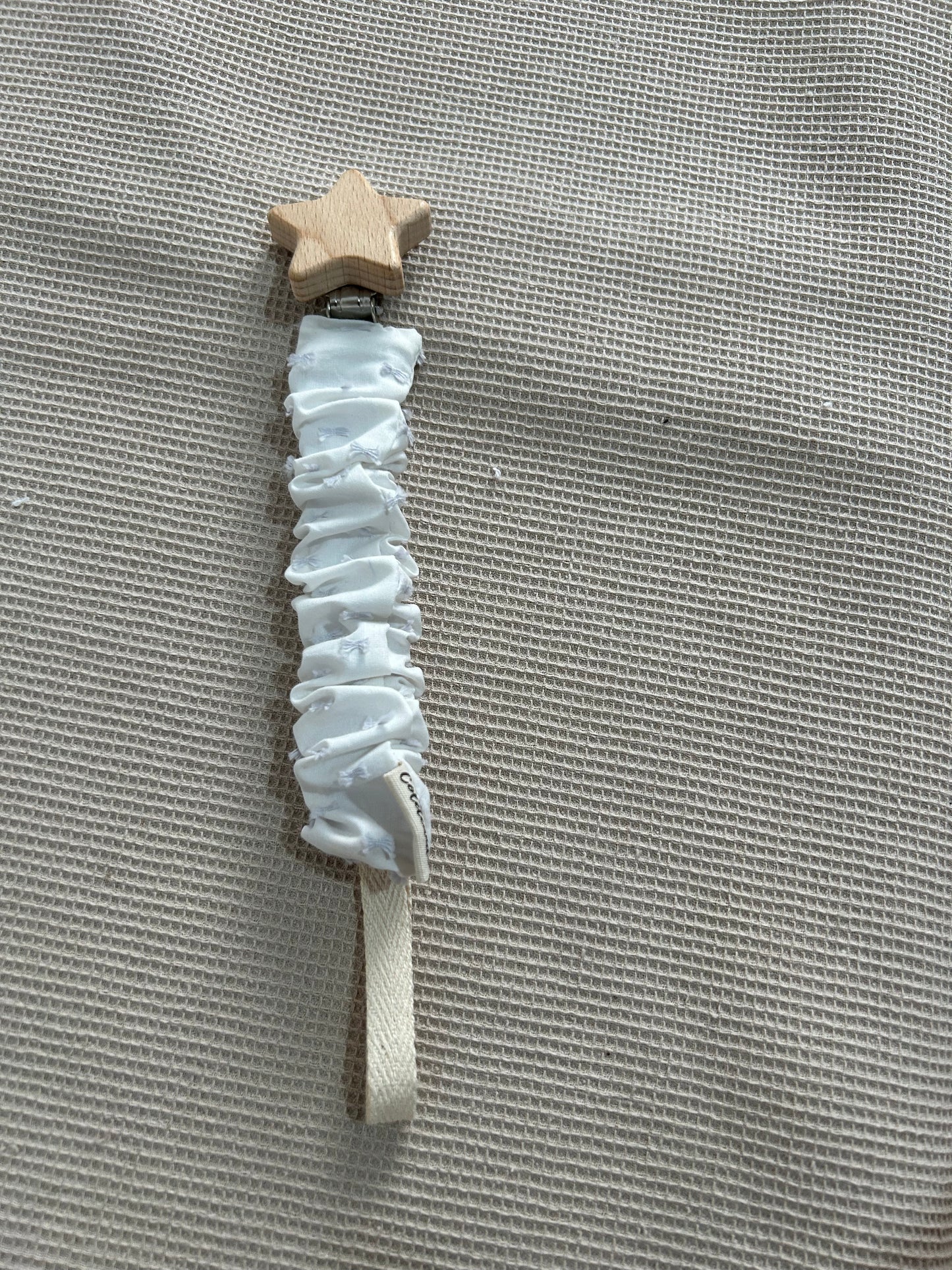 Chupetero plumeti blanco y gris