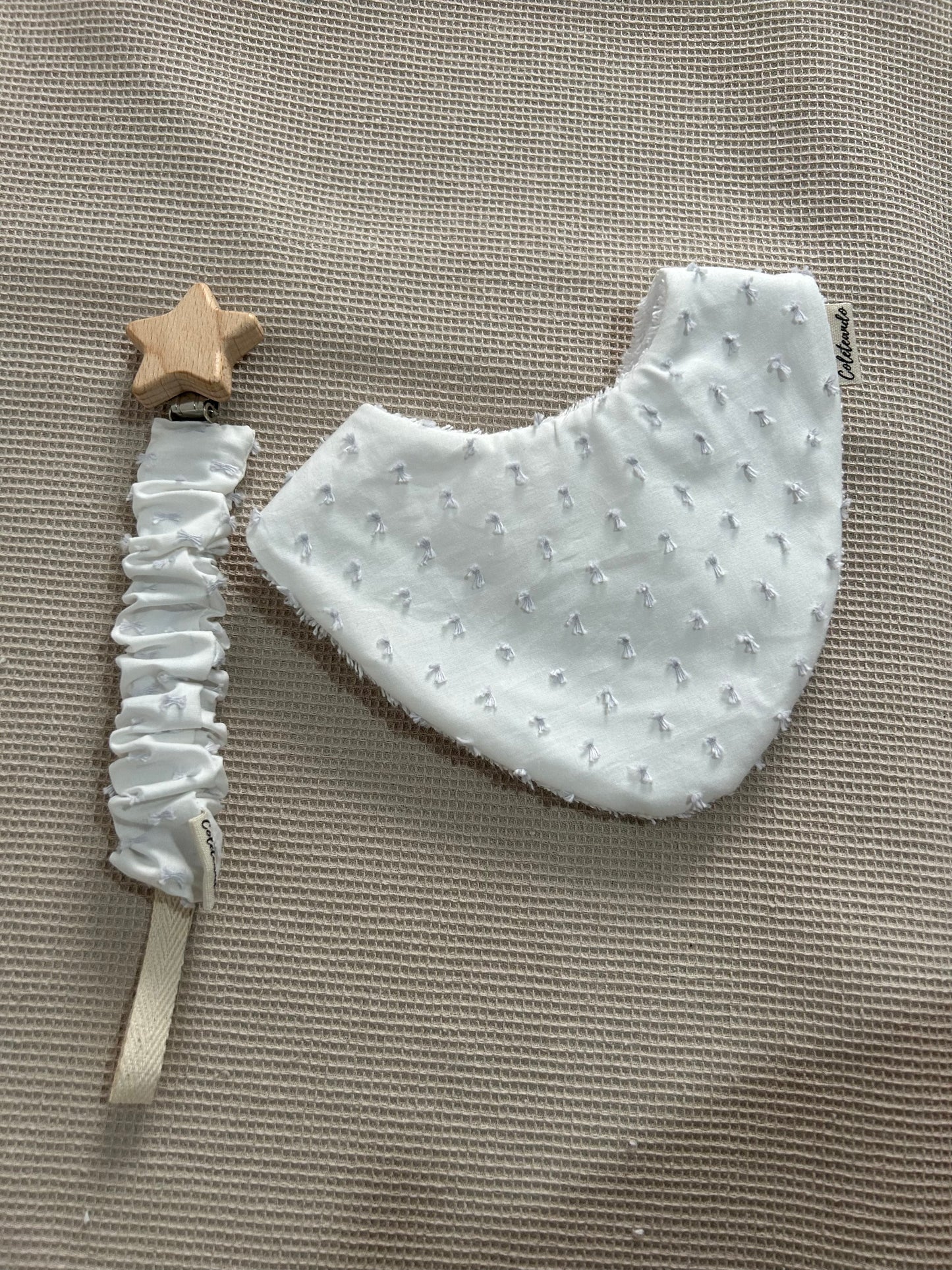 Chupetero plumeti blanco y gris