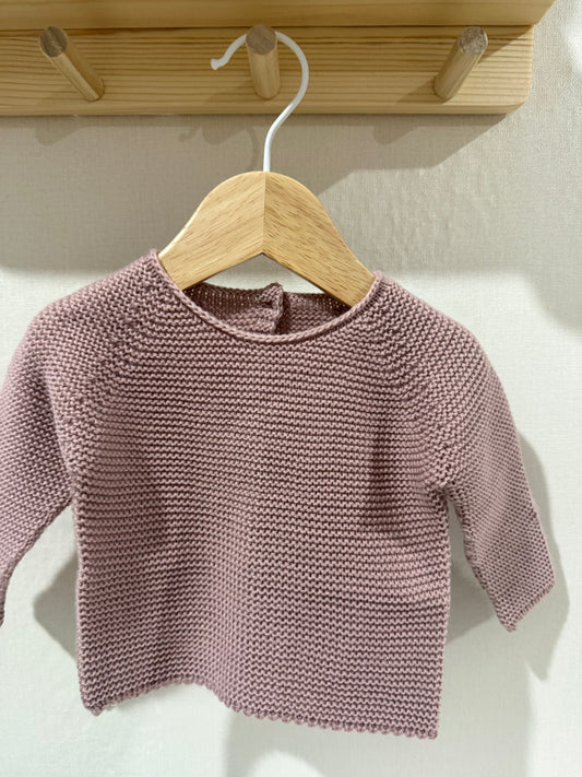 Jersey de punto rosa maquillaje