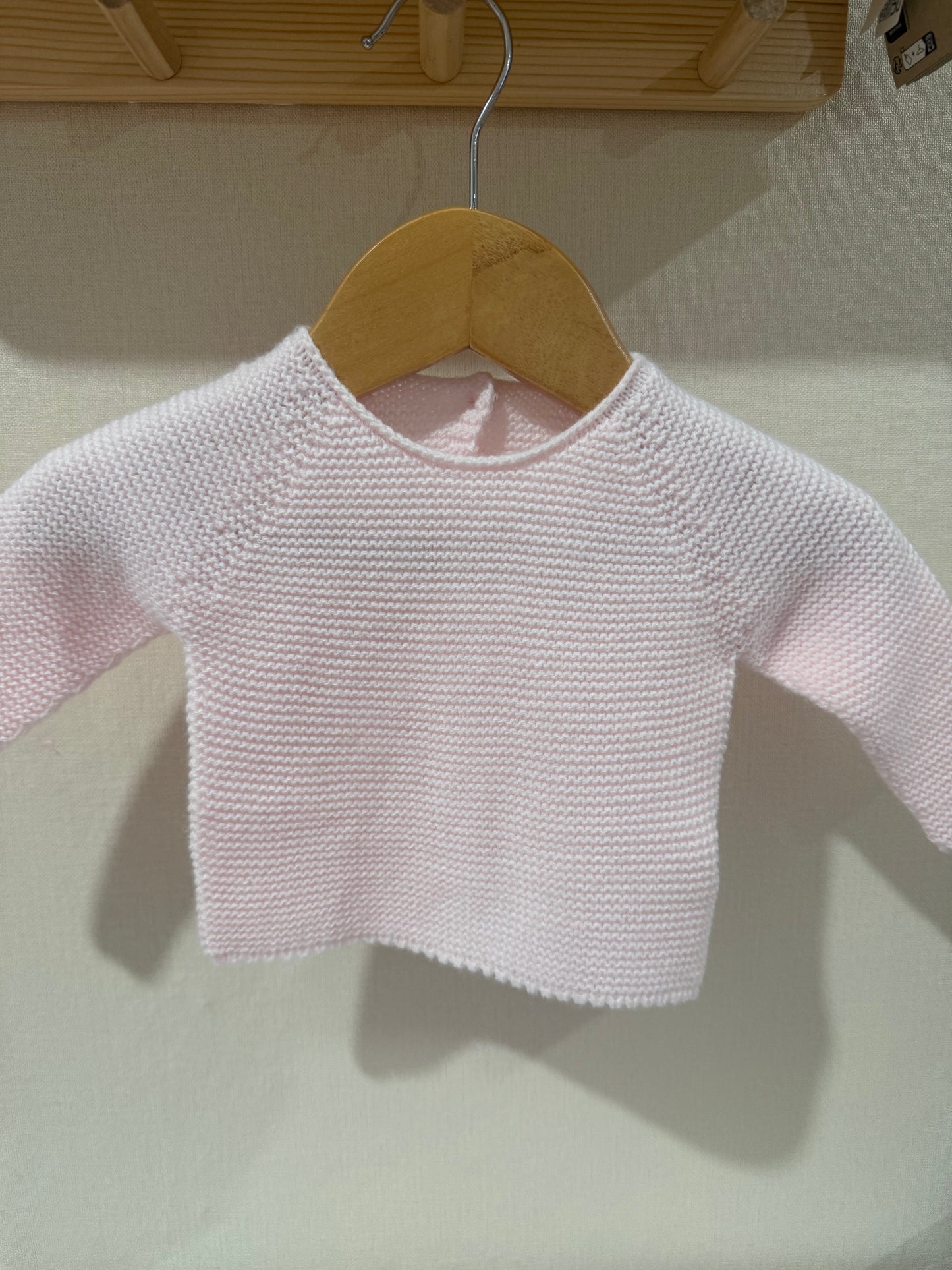 Jersey de punto rosa bebé
